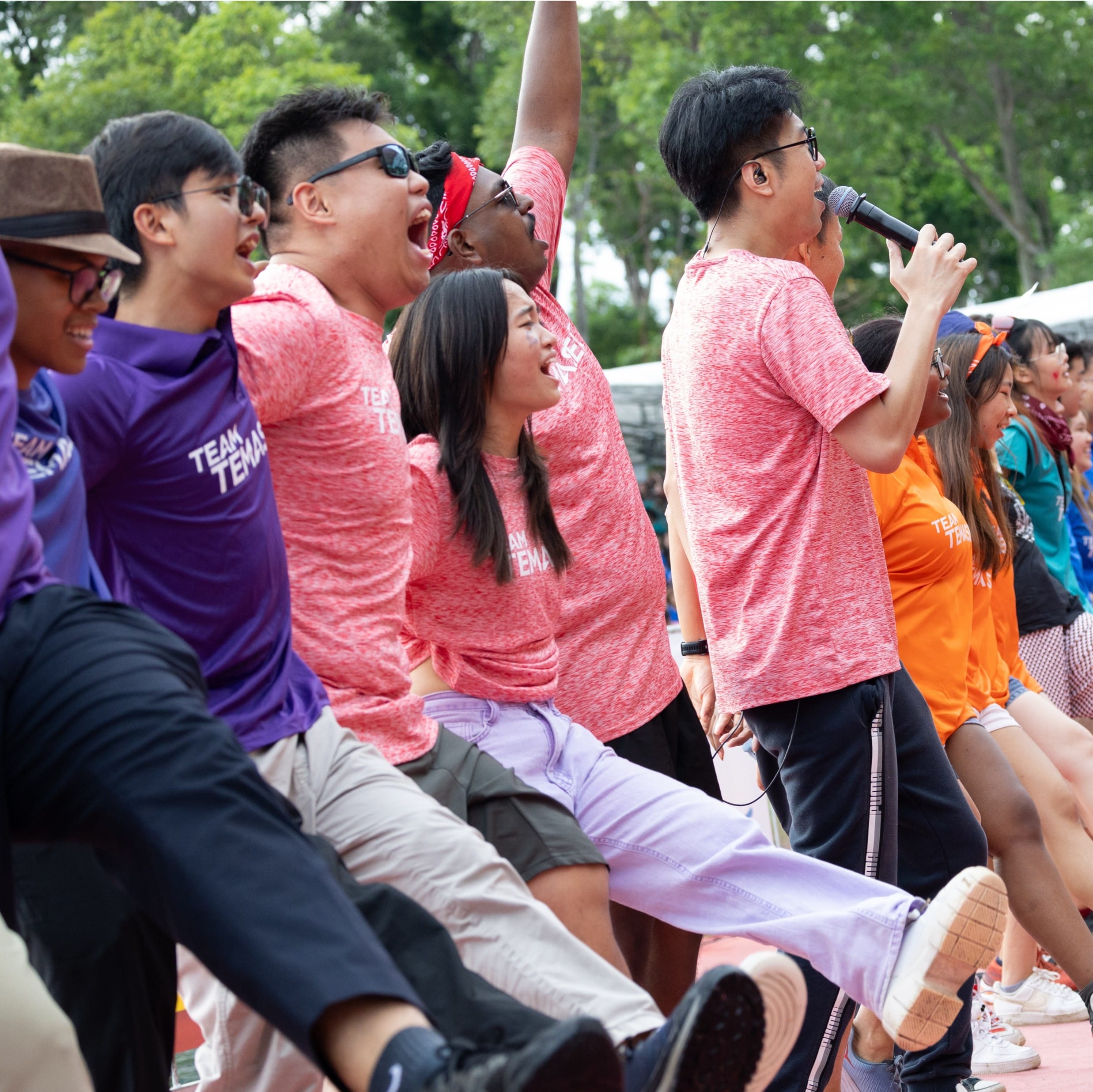 Image of P10 Club student leaders leading cheers at the Freshment Orientation finale event in TP